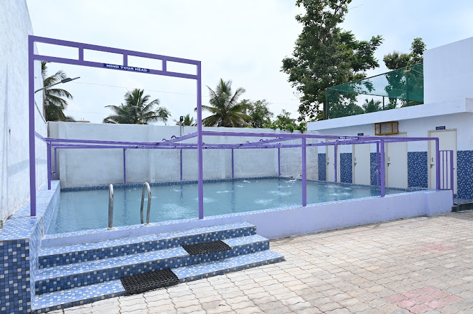 Unwind by the pool at SS Farmhouse in Katanayakanapura