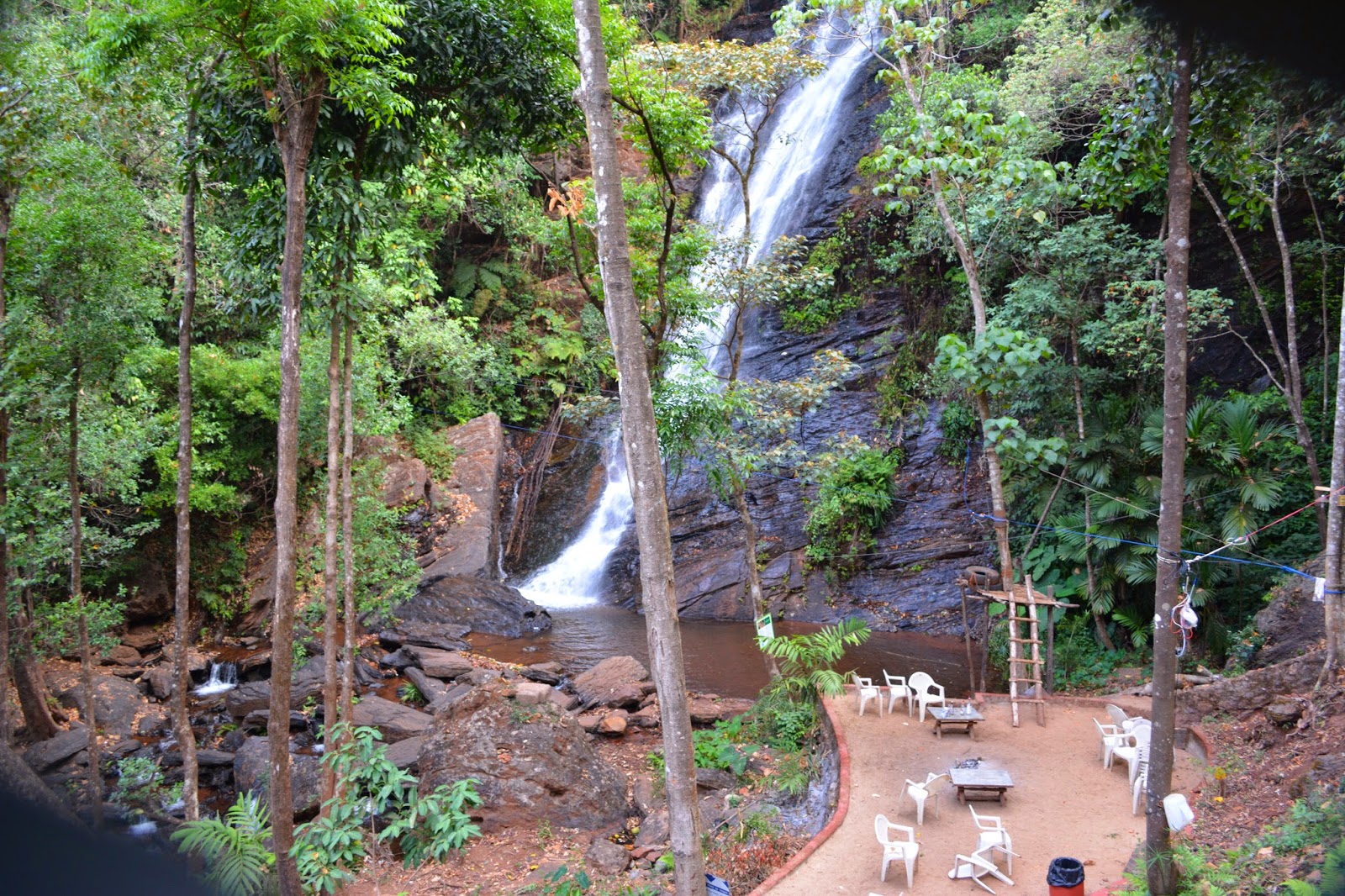 Enjoying breakfast at our homestay in Chikmagalur with a view of the waterfalls 