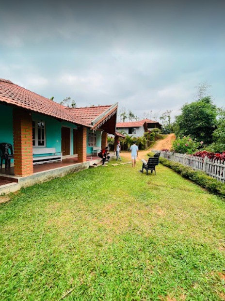 Relaxing outdoor area of a budget homestay in Sakleshpur ideal for evening tea